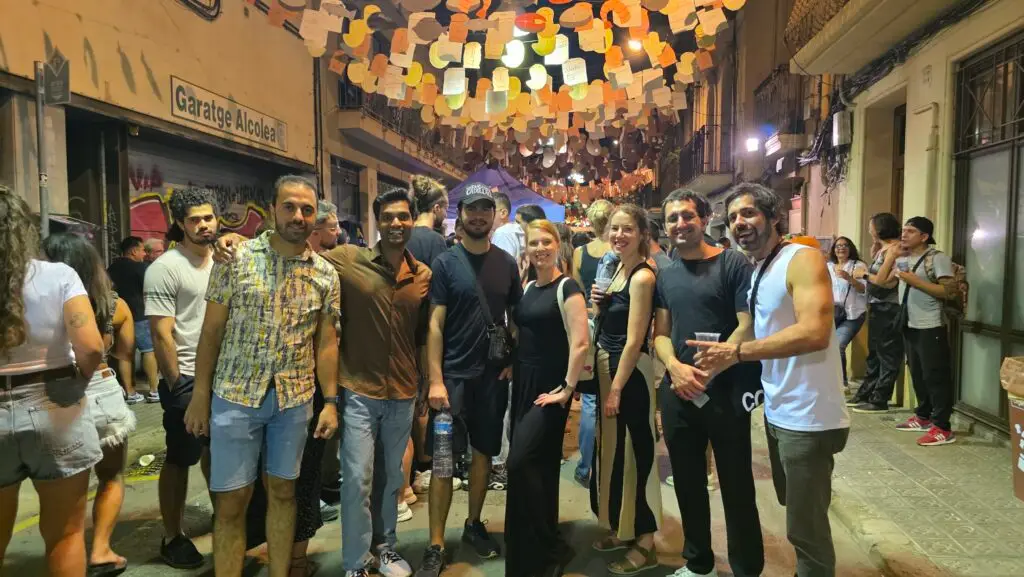 International friends enjoying the Fiestas de Sants in Barcelona last Friday, with live music, dancing, and a festive street atmosphere.