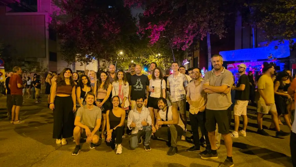 Friends enjoying the second day of the Poblenou Festival 2025 in Barcelona, with music, street parties, and international community celebrations.