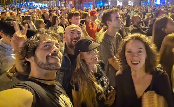 International group watching the Three Kings Parade (Cabalgata de los Reyes Magos) in Barcelona on January 5th during the Epiphany celebration.