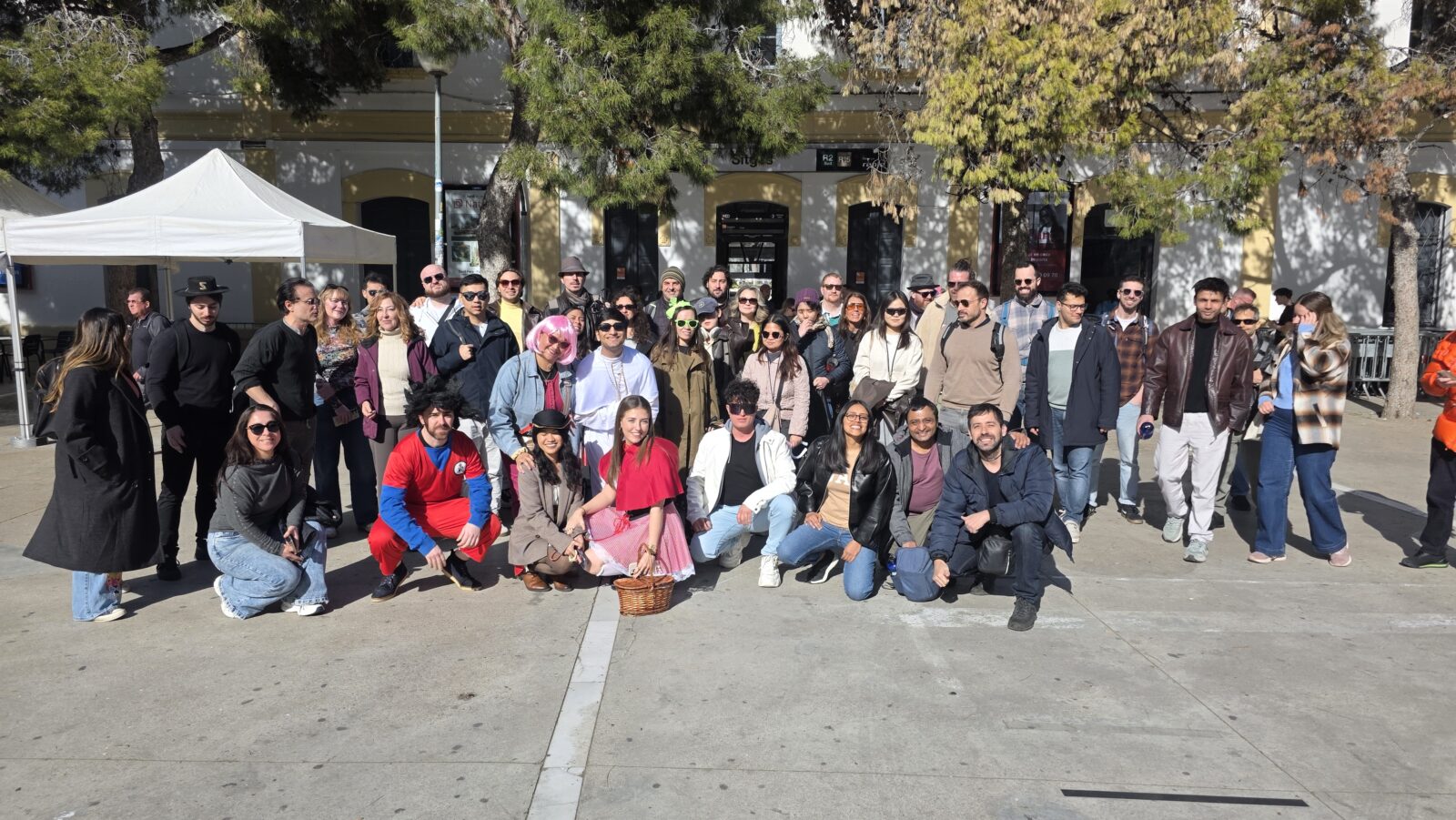 International group of 50 people visiting Sitges Carnival 2026 near Barcelona Spain