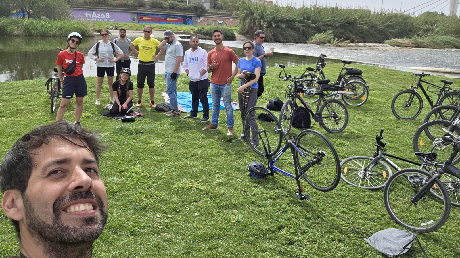 Cycling group at Besos River during a bike ride from Barcelona to Ripollet organized by New in Barcelona